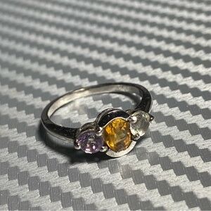 926 Sterling Silver Ring with Yellow , White, and Purple Stones